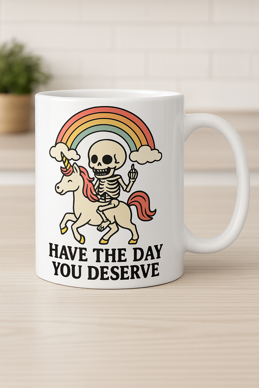 Have The Day You Deserve — Skeleton on Unicorn Rainbow Mug 🦄💀🌈